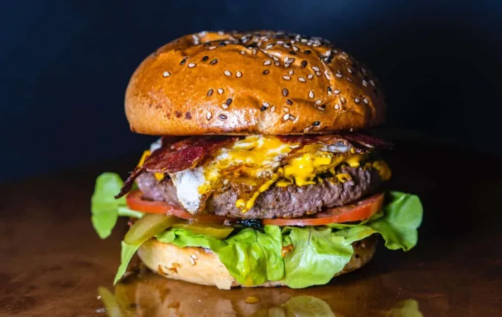 Burger and fries plated at a burger bar using Resos online bookings