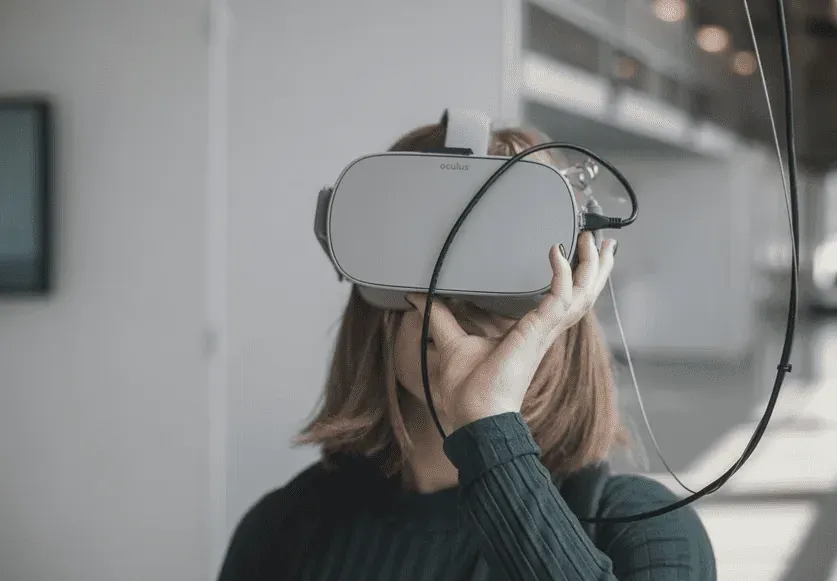 Person experiencing virtual reality (VR) technology.